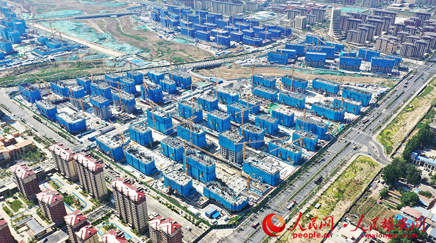 航拍雄安新區(qū)容西片區(qū)二期F單元安置房及配套設(shè)施項(xiàng)目F5標(biāo)段。中冶建工供圖