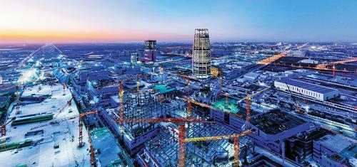 今年1月航拍的雄安國(guó)貿(mào)中心項(xiàng)目建設(shè)現(xiàn)場(chǎng)。雄安新區(qū)財(cái)政局通過(guò)“投建運(yùn)一體化”模式，吸引經(jīng)營(yíng)主體購(gòu)買(mǎi)雄安集團(tuán)雄商置業(yè)公司30%股權(quán)，有效吸引社會(huì)資本支持雄安國(guó)貿(mào)中心項(xiàng)目建設(shè)。（本報(bào)資料片）雄安新區(qū)宣傳網(wǎng)信局供圖